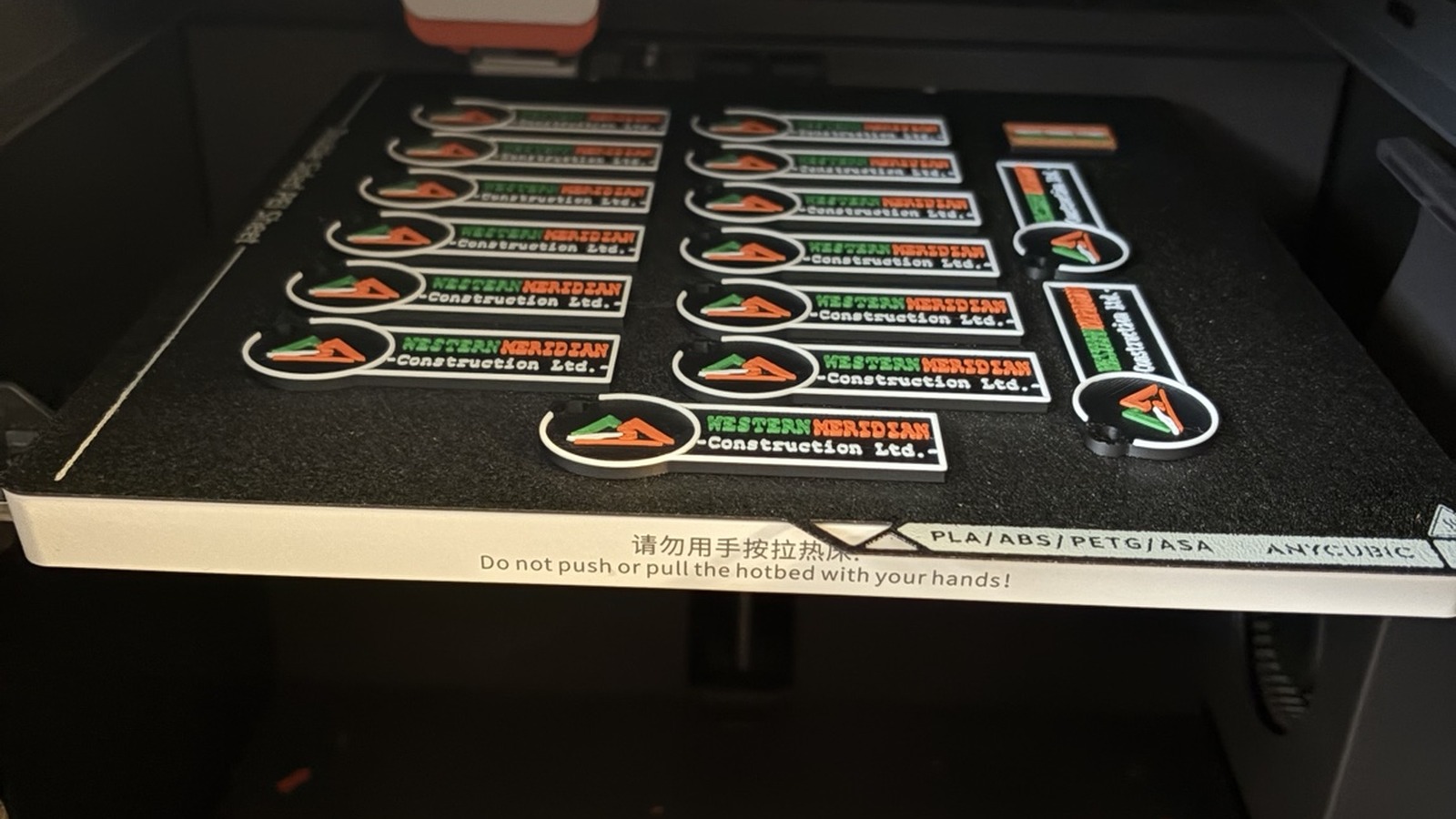 Custom products being printed on a 3D printer bed